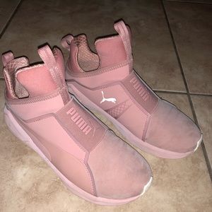 Puma nudish pink shoes.